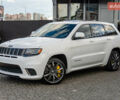 Білий Джип Grand Cherokee, об'ємом двигуна 6.2 л та пробігом 148 тис. км за 57700 $, фото 1 на Automoto.ua