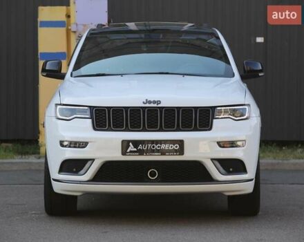 Белый Джип Гранд Чероки, объемом двигателя 5.65 л и пробегом 80 тыс. км за 35900 $, фото 1 на Automoto.ua