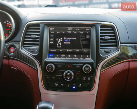 Білий Джип Grand Cherokee, об'ємом двигуна 6.2 л та пробігом 148 тис. км за 57700 $, фото 22 на Automoto.ua