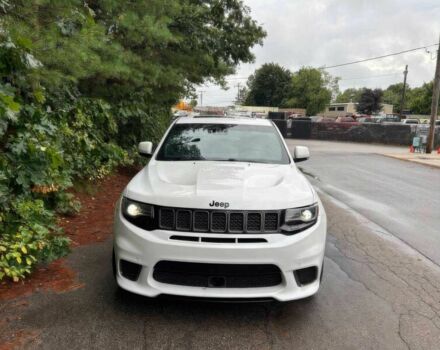 Белый Джип Гранд Чероки, объемом двигателя 6.2 л и пробегом 31 тыс. км за 13200 $, фото 1 на Automoto.ua