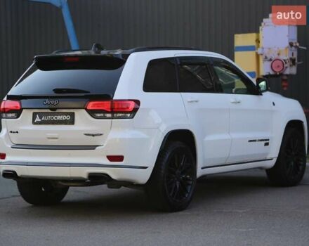 Белый Джип Гранд Чероки, объемом двигателя 5.65 л и пробегом 80 тыс. км за 35900 $, фото 6 на Automoto.ua