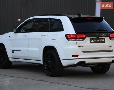 Белый Джип Гранд Чероки, объемом двигателя 5.65 л и пробегом 80 тыс. км за 35900 $, фото 4 на Automoto.ua