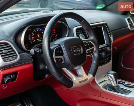 Білий Джип Grand Cherokee, об'ємом двигуна 6.2 л та пробігом 148 тис. км за 57700 $, фото 19 на Automoto.ua