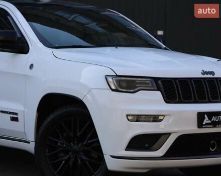 Белый Джип Гранд Чероки, объемом двигателя 5.65 л и пробегом 80 тыс. км за 35900 $, фото 3 на Automoto.ua