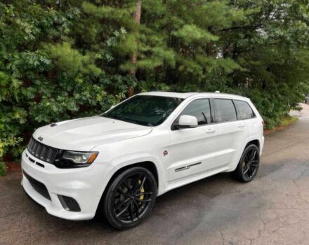 Белый Джип Гранд Чероки, объемом двигателя 6.2 л и пробегом 31 тыс. км за 13200 $, фото 2 на Automoto.ua