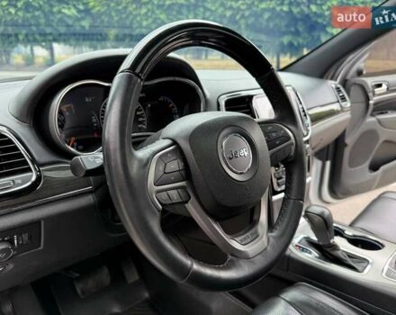 Білий Джип Grand Cherokee, об'ємом двигуна 5.65 л та пробігом 97 тис. км за 34900 $, фото 9 на Automoto.ua