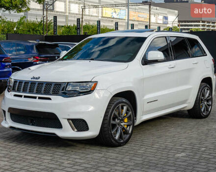 Білий Джип Grand Cherokee, об'ємом двигуна 6.2 л та пробігом 148 тис. км за 57700 $, фото 3 на Automoto.ua