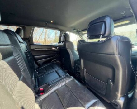 Белый Джип Гранд Чероки, объемом двигателя 6.2 л и пробегом 39 тыс. км за 12400 $, фото 12 на Automoto.ua