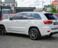 Білий Джип Grand Cherokee, об'ємом двигуна 6.2 л та пробігом 148 тис. км за 57700 $, фото 6 на Automoto.ua