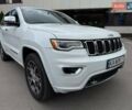 Білий Джип Grand Cherokee, об'ємом двигуна 5.65 л та пробігом 97 тис. км за 34900 $, фото 1 на Automoto.ua