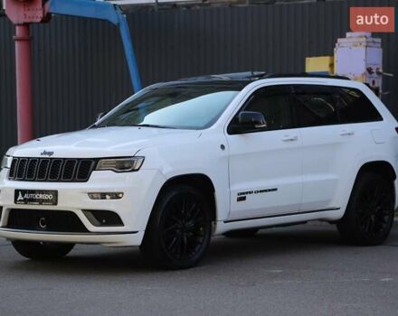 Белый Джип Гранд Чероки, объемом двигателя 5.65 л и пробегом 80 тыс. км за 35900 $, фото 2 на Automoto.ua