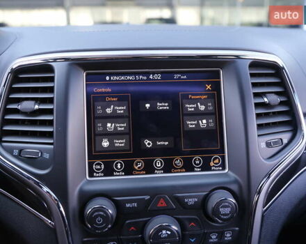 Белый Джип Гранд Чероки, объемом двигателя 5.65 л и пробегом 80 тыс. км за 35900 $, фото 19 на Automoto.ua