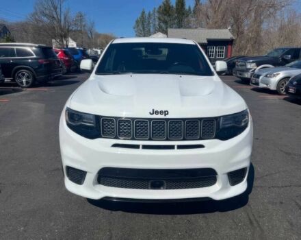 Белый Джип Гранд Чероки, объемом двигателя 6.2 л и пробегом 39 тыс. км за 12400 $, фото 1 на Automoto.ua