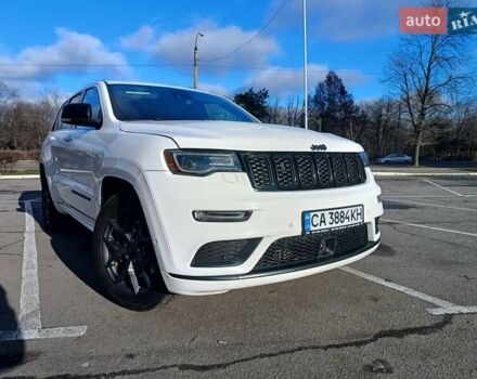 Белый Джип Гранд Чероки, объемом двигателя 5.65 л и пробегом 154 тыс. км за 28900 $, фото 1 на Automoto.ua
