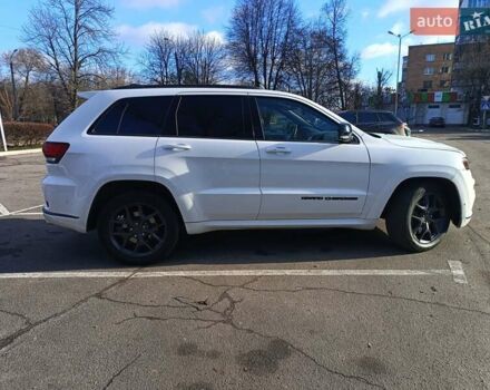 Белый Джип Гранд Чероки, объемом двигателя 5.65 л и пробегом 154 тыс. км за 28900 $, фото 6 на Automoto.ua