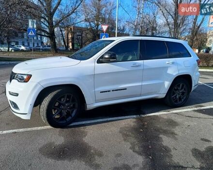 Белый Джип Гранд Чероки, объемом двигателя 5.65 л и пробегом 154 тыс. км за 28900 $, фото 3 на Automoto.ua
