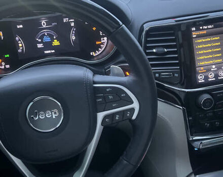 Білий Джип Grand Cherokee, об'ємом двигуна 5.65 л та пробігом 76 тис. км за 40000 $, фото 11 на Automoto.ua