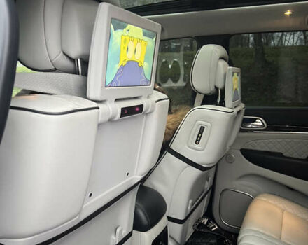 Білий Джип Grand Cherokee, об'ємом двигуна 5.65 л та пробігом 76 тис. км за 40000 $, фото 13 на Automoto.ua