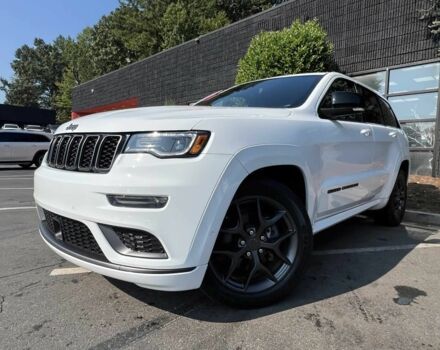 Белый Джип Гранд Чероки, объемом двигателя 3.6 л и пробегом 55 тыс. км за 21000 $, фото 2 на Automoto.ua