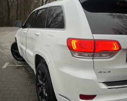 Білий Джип Grand Cherokee, об'ємом двигуна 5.65 л та пробігом 76 тис. км за 40000 $, фото 2 на Automoto.ua