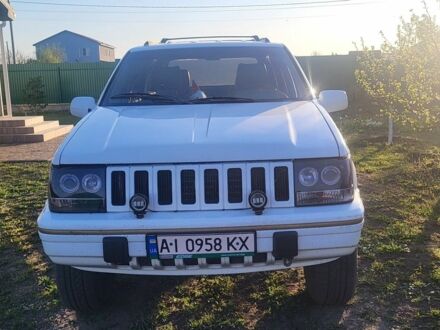 Білий Джип Grand Cherokee, об'ємом двигуна 4 л та пробігом 428 тис. км за 4000 $, фото 1 на Automoto.ua
