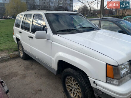 Білий Джип Grand Cherokee, об'ємом двигуна 5.2 л та пробігом 260 тис. км за 5200 $, фото 1 на Automoto.ua