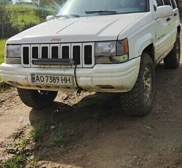 Білий Джип Grand Cherokee, об'ємом двигуна 5.2 л та пробігом 400 тис. км за 5500 $, фото 1 на Automoto.ua