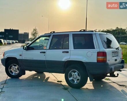 Білий Джип Grand Cherokee, об'ємом двигуна 3.96 л та пробігом 334 тис. км за 4449 $, фото 1 на Automoto.ua