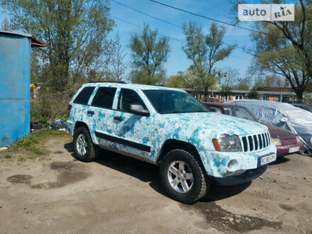 Білий Джип Grand Cherokee, об'ємом двигуна 3 л та пробігом 257 тис. км за 8000 $, фото 1 на Automoto.ua