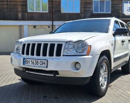 Білий Джип Grand Cherokee, об'ємом двигуна 4.7 л та пробігом 220 тис. км за 11300 $, фото 1 на Automoto.ua