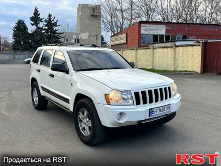 Белый Джип Гранд Чероки, объемом двигателя 4.7 л и пробегом 220 тыс. км за 7200 $, фото 1 на Automoto.ua