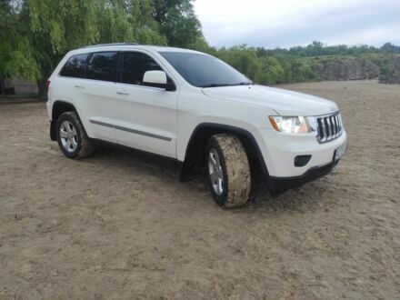 Білий Джип Grand Cherokee, об'ємом двигуна 3.6 л та пробігом 330 тис. км за 16500 $, фото 1 на Automoto.ua