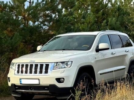 Білий Джип Grand Cherokee, об'ємом двигуна 3 л та пробігом 220 тис. км за 18500 $, фото 1 на Automoto.ua