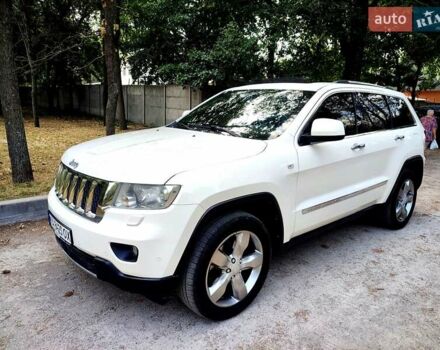 Білий Джип Grand Cherokee, об'ємом двигуна 3 л та пробігом 285 тис. км за 12700 $, фото 1 на Automoto.ua