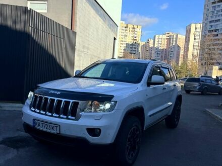 Білий Джип Grand Cherokee, об'ємом двигуна 3 л та пробігом 250 тис. км за 12850 $, фото 1 на Automoto.ua