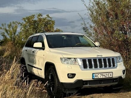 Білий Джип Grand Cherokee, об'ємом двигуна 2.99 л та пробігом 237 тис. км за 14000 $, фото 1 на Automoto.ua