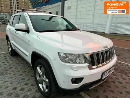 Белый Джип Гранд Чероки, объемом двигателя 3 л и пробегом 150 тыс. км за 15400 $, фото 1 на Automoto.ua