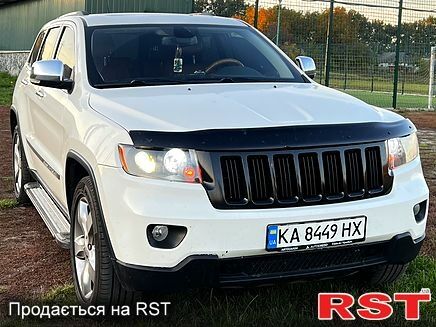 Белый Джип Гранд Чероки, объемом двигателя 3.6 л и пробегом 178 тыс. км за 14500 $, фото 1 на Automoto.ua