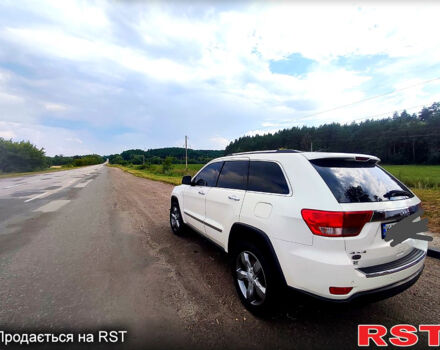 Білий Джип Grand Cherokee, об'ємом двигуна 3 л та пробігом 280 тис. км за 15900 $, фото 1 на Automoto.ua