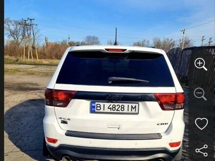 Белый Джип Гранд Чероки, объемом двигателя 3 л и пробегом 255 тыс. км за 16500 $, фото 1 на Automoto.ua