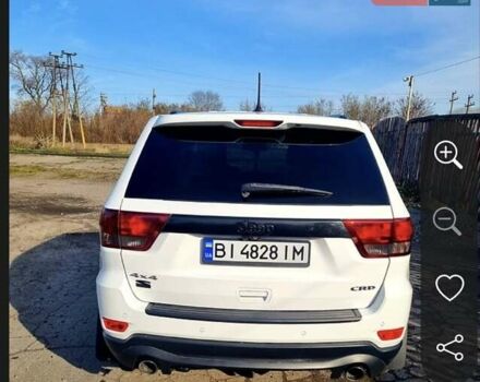 Белый Джип Гранд Чероки, объемом двигателя 3 л и пробегом 255 тыс. км за 16500 $, фото 1 на Automoto.ua
