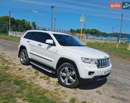Білий Джип Grand Cherokee, об'ємом двигуна 2.99 л та пробігом 183 тис. км за 15500 $, фото 1 на Automoto.ua