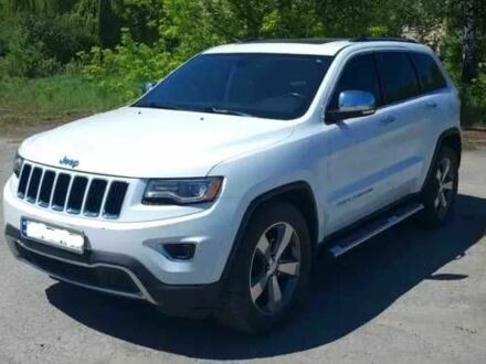 Белый Джип Гранд Чероки, объемом двигателя 3 л и пробегом 180 тыс. км за 10000 $, фото 1 на Automoto.ua