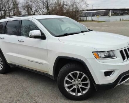 Белый Джип Гранд Чероки, объемом двигателя 5.7 л и пробегом 88 тыс. км за 13000 $, фото 1 на Automoto.ua