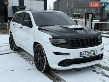 Білий Джип Grand Cherokee, об'ємом двигуна 6.42 л та пробігом 177 тис. км за 29000 $, фото 1 на Automoto.ua