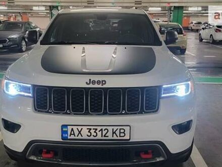 Білий Джип Grand Cherokee, об'ємом двигуна 5.7 л та пробігом 89 тис. км за 35000 $, фото 1 на Automoto.ua