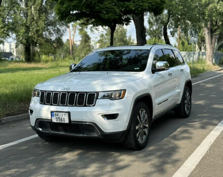 Білий Джип Grand Cherokee, об'ємом двигуна 5.65 л та пробігом 108 тис. км за 26700 $, фото 1 на Automoto.ua