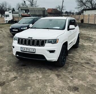 Белый Джип Гранд Чероки, объемом двигателя 3.6 л и пробегом 209 тыс. км за 19999 $, фото 1 на Automoto.ua