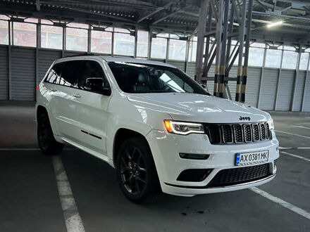 Білий Джип Grand Cherokee, об'ємом двигуна 5.7 л та пробігом 40 тис. км за 38500 $, фото 1 на Automoto.ua