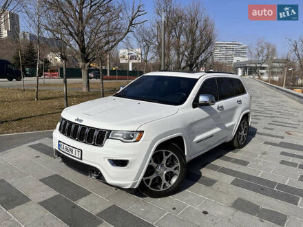 Білий Джип Grand Cherokee, об'ємом двигуна 5.7 л та пробігом 66 тис. км за 37000 $, фото 1 на Automoto.ua